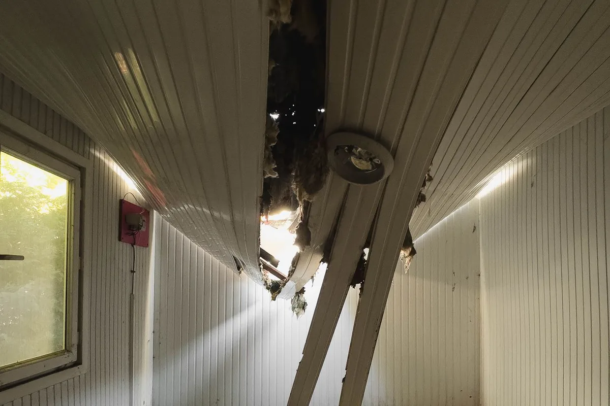 Water-damaged ceiling and interior after a leak in a Cookeville home
